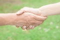 Closeup of people shaking hands