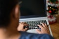 Closeup, People using laptop computer devices at home. A man typing a keyboard notebook computer in the living room at home, Blank Royalty Free Stock Photo