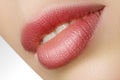 Closeup perfect natural lip makeup. Beautiful plump full lips on female face. Clean skin, fresh make-up. Spa tender lips Royalty Free Stock Photo