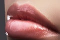 Closeup perfect natural lip makeup. Beautiful plump full lips on female face. Clean skin, fresh make-up. Spa tender lips Royalty Free Stock Photo