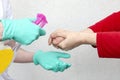 Closeup of a person sanitizing hands with hand sanitizer - COVID-19