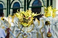 Closeup person in sparkling demon costume poses for photo at dominican carnival