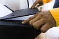 Closeup of a person using a scanner on the desk at home Royalty Free Stock Photo