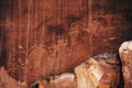 Closeup of petroglyphs on a red rock surface at the Capitol Reef National Park in Utah Royalty Free Stock Photo