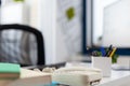 Closeup of phone on desk in empty business office. Royalty Free Stock Photo