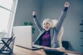 Closeup photo of aged business lady hands raised up investment success notebook table sit office chair wear specs Royalty Free Stock Photo