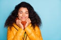 Closeup photo of beautiful dark skin wavy lady enjoy autumn weather outside and warm clothes wear yellow fall overcoat Royalty Free Stock Photo