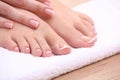 Closeup photo of a beautiful female feet with red pedicure isolated on white Royalty Free Stock Photo