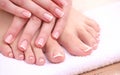 Closeup photo of a beautiful female feet with red Royalty Free Stock Photo