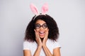 Closeup photo of beautiful funny dark skin lady adorable smile arms on cheeks crazy wear freak specs fluffy ears Royalty Free Stock Photo