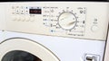 Closeup photo of buttons and knobs on washing machine control panel Royalty Free Stock Photo