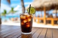 Closeup Photo Of Cold Cola Soda Drink In Glass With Lime Slice And Straw, Placed On Bar Counter With Royalty Free Stock Photo