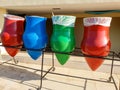 Closeup image of colorful pots used as garbage containers. It is very important for our planet and ecology to sort your
