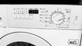 Closeup image of control panel on washing machine at laundry Royalty Free Stock Photo