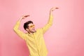 Closeup photo of cool macho guy chilling at disco party dancing modern youth moves wear sun specs stylish striped shirt