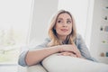 Closeup photo of domestic pretty charming blond mommy lady relaxing sit comfy couch staying home good mood dreamer