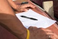 Closeup photo of drawing and carpenter's hands who is going to make design Royalty Free Stock Photo