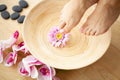 Closeup photo of a female feet at spa salon on pedicure procedure Royalty Free Stock Photo