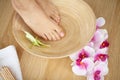 Closeup photo of a female feet at spa salon on pedicure procedure Royalty Free Stock Photo