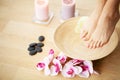 Closeup photo of a female feet at spa salon on pedicure procedure Royalty Free Stock Photo