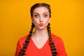 Closeup photo of funny attractive cheerful lady two cute long braids sending air kisses handsome guy playful mood wear