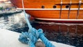 Closeup photo of old big rope mooring historic wooden ship at port Royalty Free Stock Photo