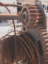 Closeup photo of old rusty winch and metal cable in sea port Royalty Free Stock Photo