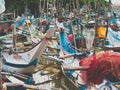 Closeup photo of old traditional poor wooden boats for fishing in ocean harbor at Sri Lanka