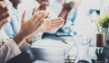 Closeup photo of partners clapping hands after business seminar. Professional education, work meeting, presentation or Royalty Free Stock Photo