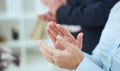 Closeup photo of partners clapping hands. Royalty Free Stock Photo