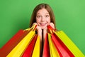 Closeup photo portrait of young brown hair teenager school girl hold stack packages from favorite shop clothes isolated