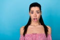 Closeup photo portrait of young woman crazy reaction open mouth impressed speechless dissatisfied isolated on blue color