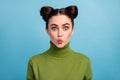 Closeup photo of pretty brunette student lady teenager two cute buns sending air kisses funny facial expression wear