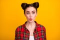 Closeup photo of pretty brunette student lady teenager two cute buns sending air kisses funny facial expression wear