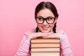 Closeup photo of pretty student lady leaning hands head books pile diligent pupil fond of reading look interested side Royalty Free Stock Photo