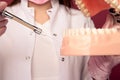 Closeup photo of process of making an anaesthesia in a jaw isolated.