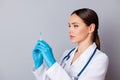 Closeup photo of professional doc serious nurse prepare syringe patient vaccination antibiotic wear latex gloves medical Royalty Free Stock Photo