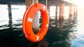 Closeup photo of red saving ring hanging wooden pier. Safety on sea water
