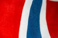 Closeup photo of a red white and blue norwegian flag..
