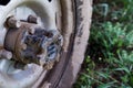 Closeup photo of the SUV front wheel,  covered in mud and clay Royalty Free Stock Photo