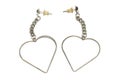 A pair of heart shaped handmade earings against a white backdrop Royalty Free Stock Photo