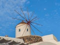 Closeup photo of a windmill in Oia village on Santorini island, Greece Royalty Free Stock Photo