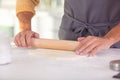 closeup photo woman rolling pastry Royalty Free Stock Photo