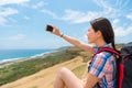 Closeup photo of woman using the mobile selfie Royalty Free Stock Photo