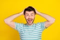 Closeup photo of young funny celebrating man shocked how low price buy new car isolated on yellow color background