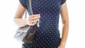 Closeup photo of young woman with handbag holding keys from house Royalty Free Stock Photo