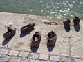 Three pairs of the Shoes Jewish Memorial on the Danube Bank in Budapest