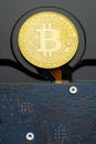 Closeup of physical Bitcoin criptocurrency coin on hard disk drive Royalty Free Stock Photo