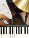 Closeup on Piano keyboard and electric guitar musical instrument Royalty Free Stock Photo