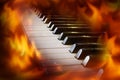 Closeup piano keyboard with fire flame screen. Royalty Free Stock Photo